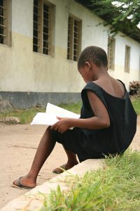 Child_studying_in_Dar_es_Salaam_1