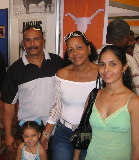 A family stops by a booth at the Havana trade fair in 2008.