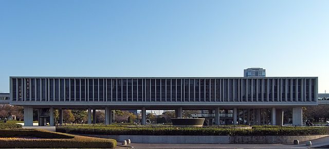 Hiroshima Peace Memorial Museum, at Naka-ku Hiroshima Japan, design by Kenzo Tange in 1955. Via Wikimedia Commons.