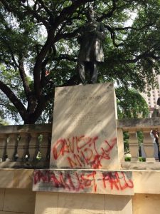 A graffiti-covered Confederate statue on the quad on the campus at UT Austin