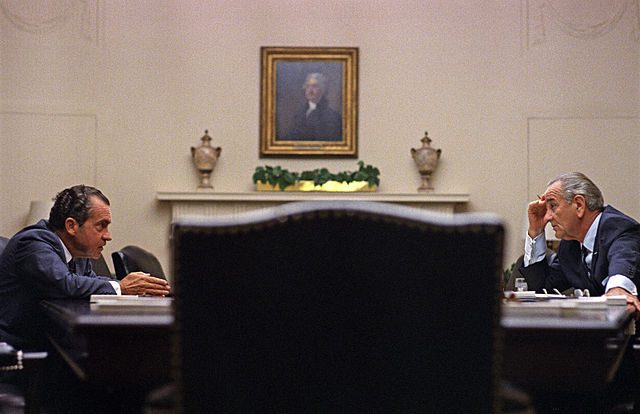 Lyndon Johnson and Richard Nixon at the White House in 1968. Via Wikimedia Commons.