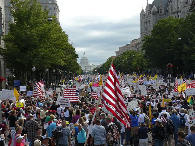 Tea Party protesters walk towards the United States Capitol during the Taxpayer March on Washington, September 12, 2009. Via Wikipedia.