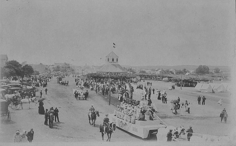 Fredericksburg, TX in 1896. The photograph shows the 50th Anniversary parade celebrating the 1846 founding of the town, with the Vereinskirche in the background (via Wikimedia)