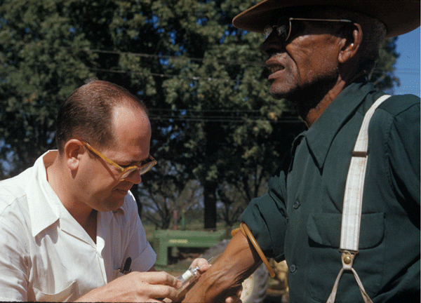 Tuskegee syphilis study doctor injects subject with placebo (Wikipedia)