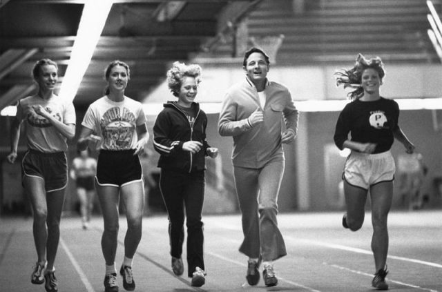 Indiana Senator Birch Bayh exercises with Title IX athletes at Purdue University, ca. 1970s (Birch Bayh Senate Office - Senatorial Papers of Birch Bayh, Indiana University)