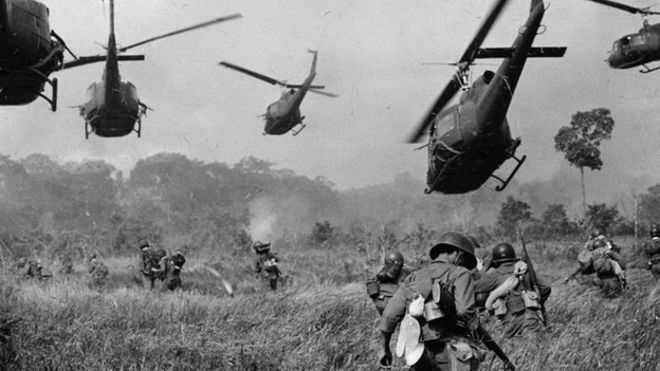 US Army helicopters pour machine-gun fire into the tree line to cover the advance of ground troops