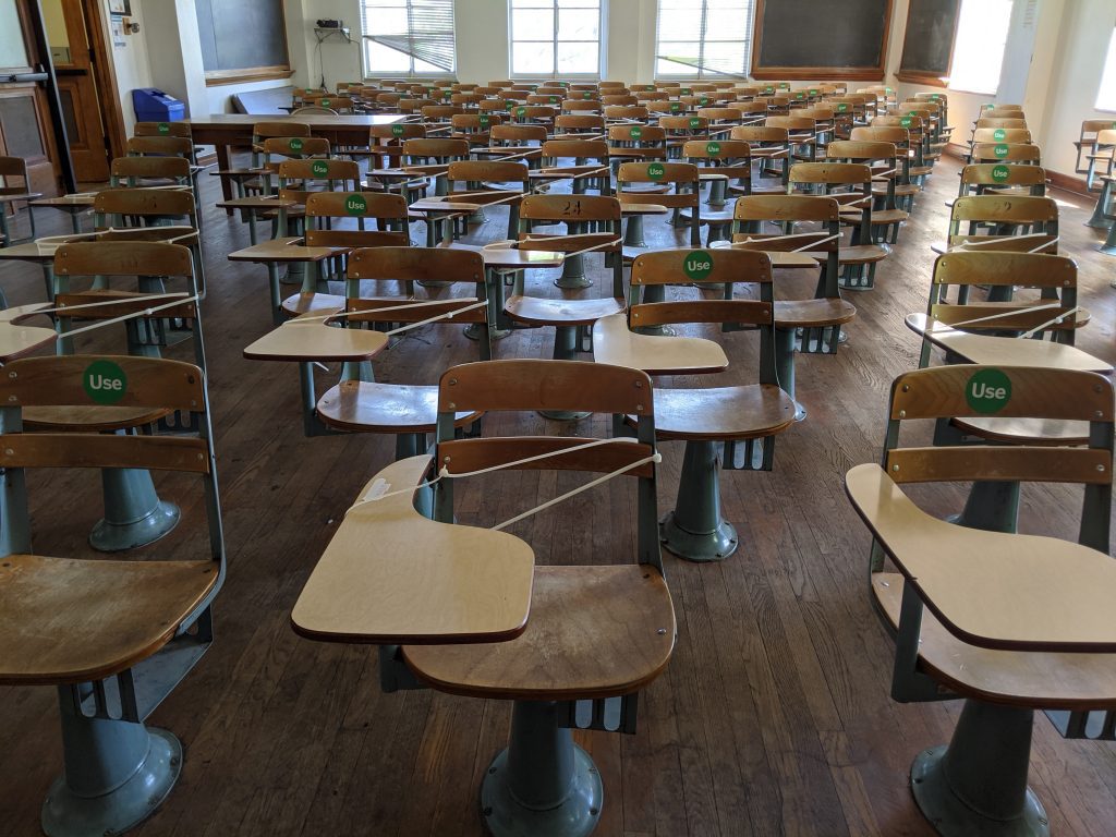 Photograph of an empty classroom in Garrison Hall on UT Austin's campus