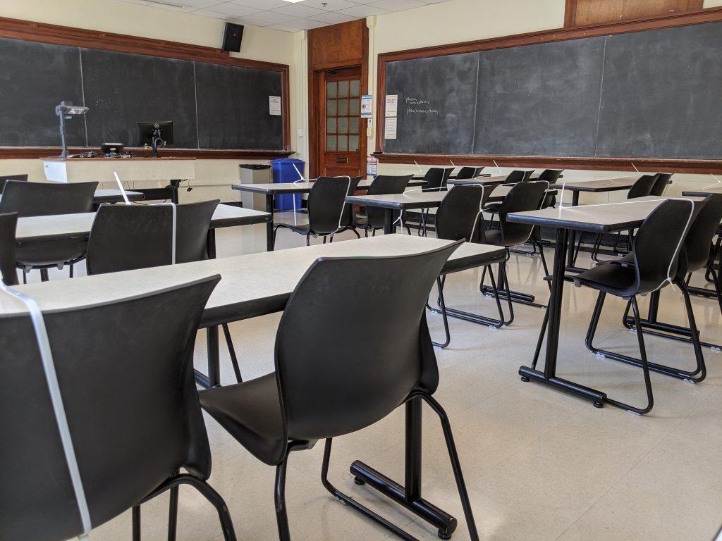 Photograph of an empty classroom in Garrison Hall on UT Austin's campus