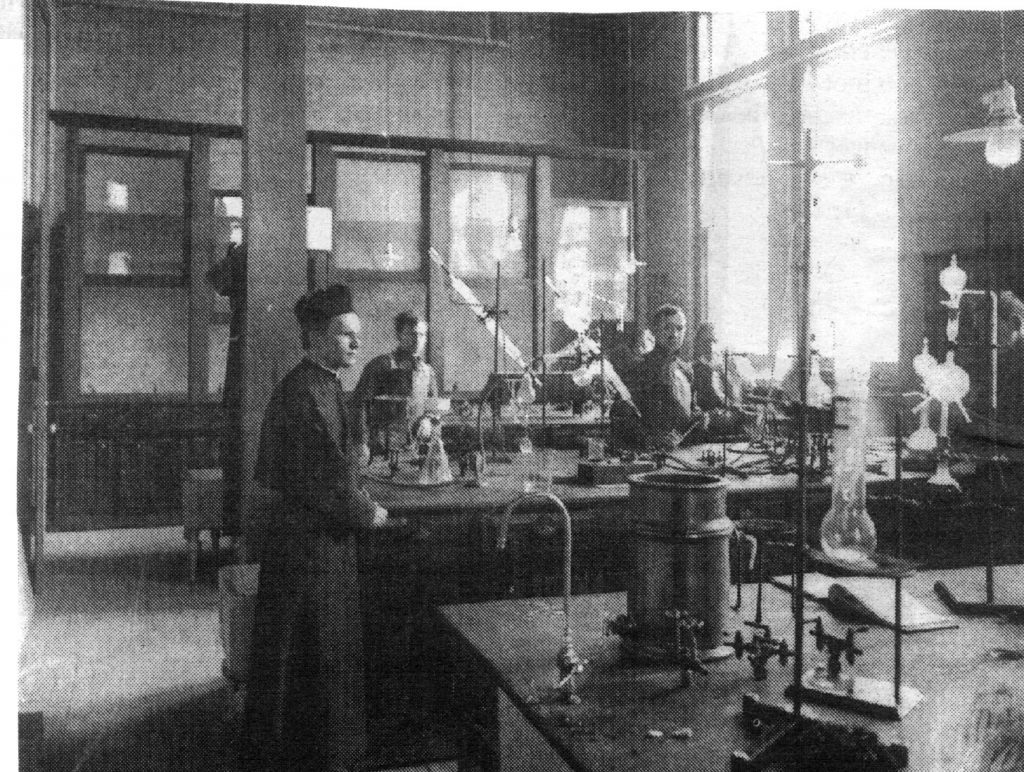 Father Julius Nieuwland in his laboratory in the old chemistry building at the University of Notre Dame in South Bend, Indiana