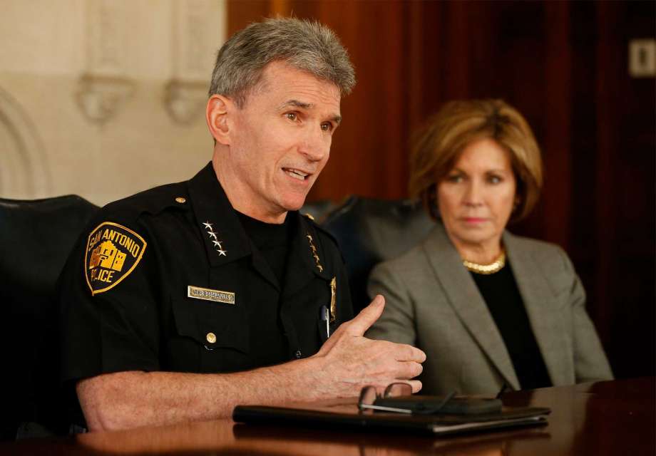 San Antonio Police Chief William McManus speaks as City Manager Sheryl Sculley looks on