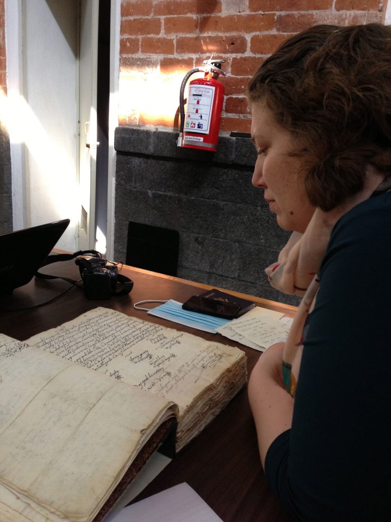 Brook Danielle Lillehaugen examines Colonial Zapotec documents in the Archivo General de la Nación, Mexico