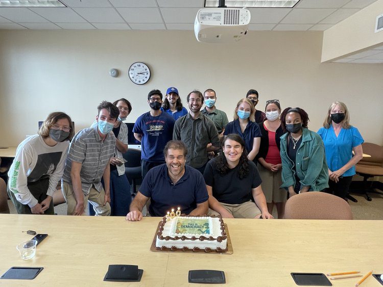 Jeremi and Zachary Suri celebrating the recording of This Is Democracy's 200th episode with members of the LAITS production team