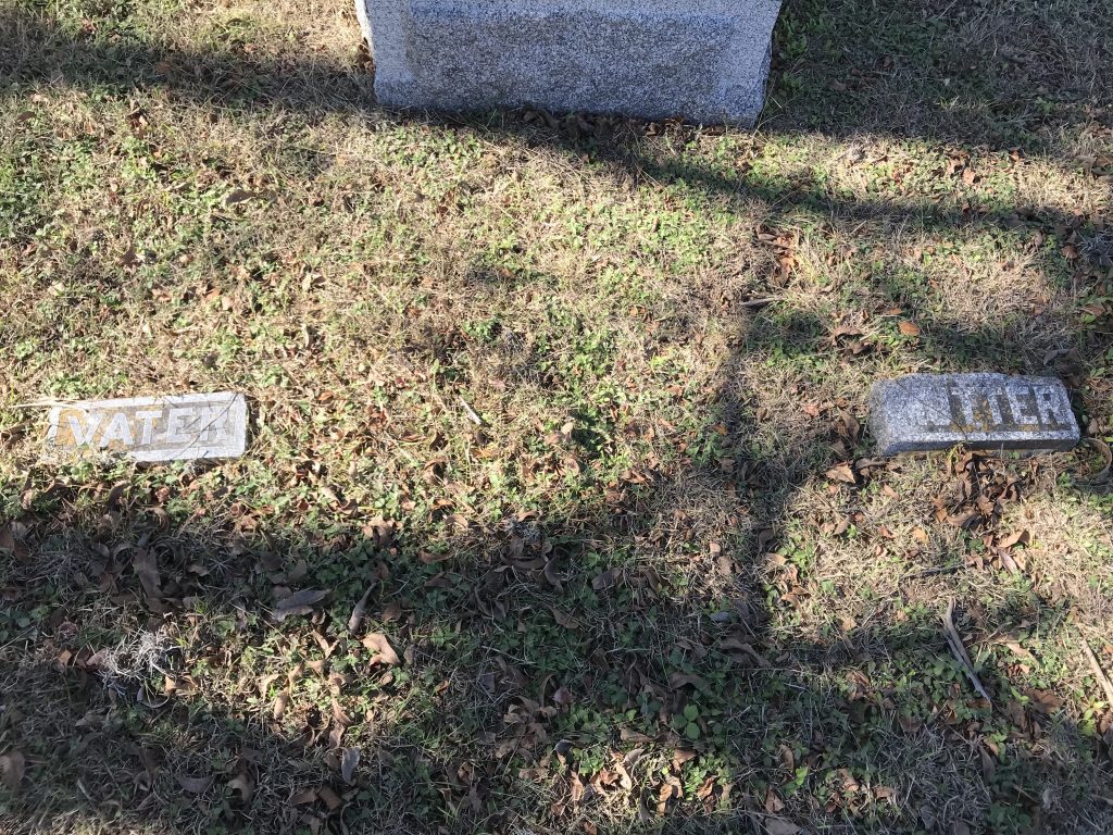 Two small gravestones bearing the simple inscriptions "Vater" and "Mutter."