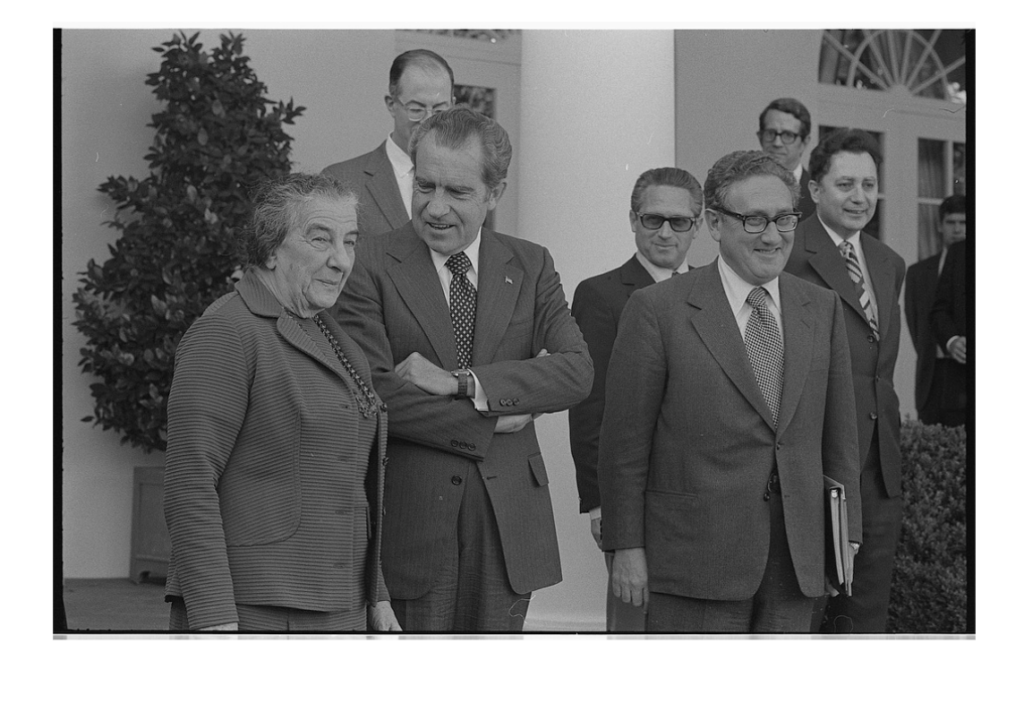 Israeli Prime Minister Golda Meir standing with president Richard Nixon and Henry Kissinger outside the White House. 