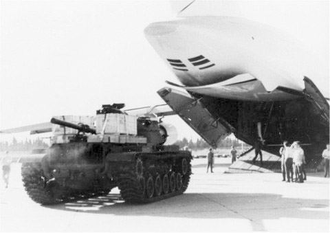 An M60 tank is unloaded from a U.S. Air Force Lockheed C-5A Galaxy in Israel during "Operation Nickel Grass" in 1973.