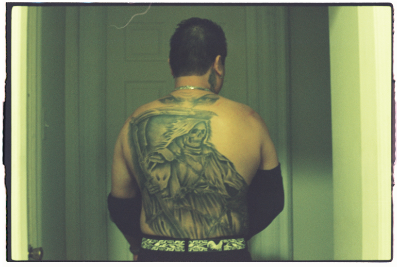 M took off his shirt to show me his Santa Muerte tattoo. 