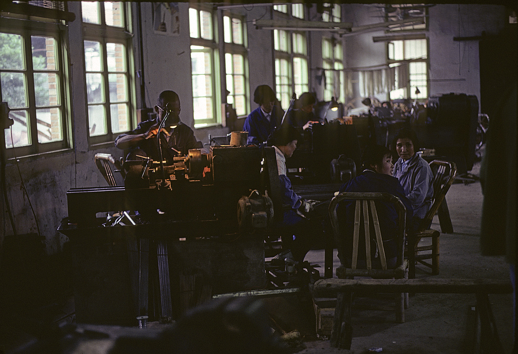 Workers in a "commune candle" factory, China, 1979. 
