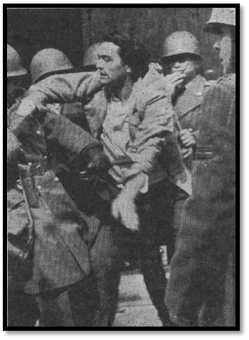 Luciano Cruz in close contact with policemen.