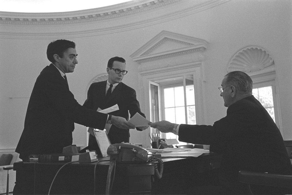 Dick Goodwin, Bill Moyers, President Lyndon B. Johnson, 1965. 