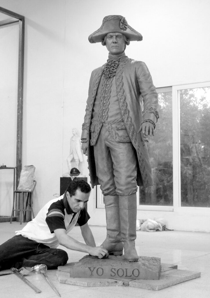 Spanish sculptor Salvador Amaya works on a statue of Bernardo de Gálvez. 