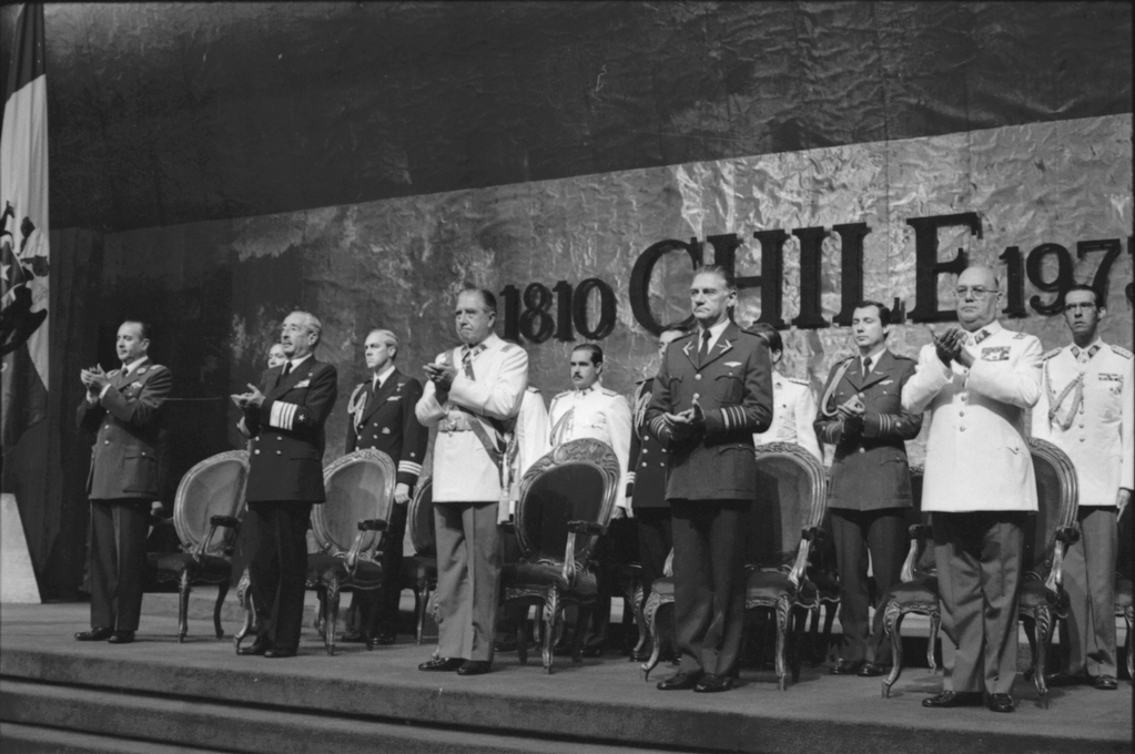 The military junta and Augusto Pinochet Ugarte at the Diego Portales Building for another celebration of the Constitution. In the front row, from left to right: César Mendoza, José Toribio Merino, Augusto Pinochet, Fernando Matthei, and Humberto Gordon.